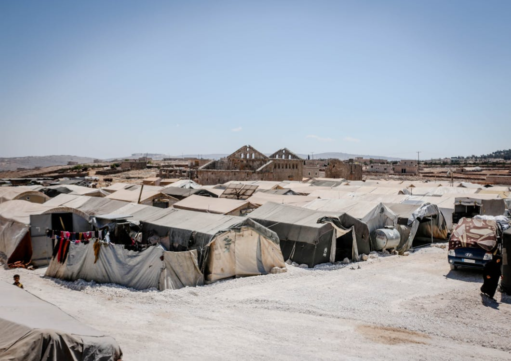 what drives refugee surges shown through large refugee camp settlement
